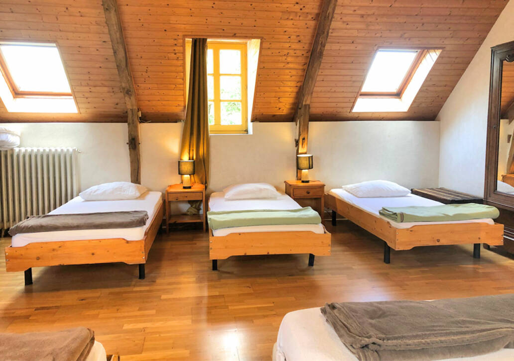 Chambre 1 lit double et 4 lits simples de la location proche de Montoir de Bretagne